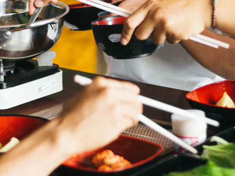 Friends sharing Chinese hotpot